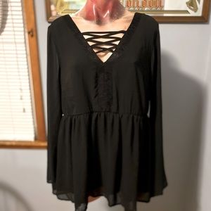 Criss-cross bell sleeve peasant top